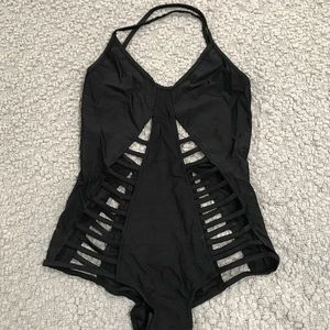 Cut out side body suit
